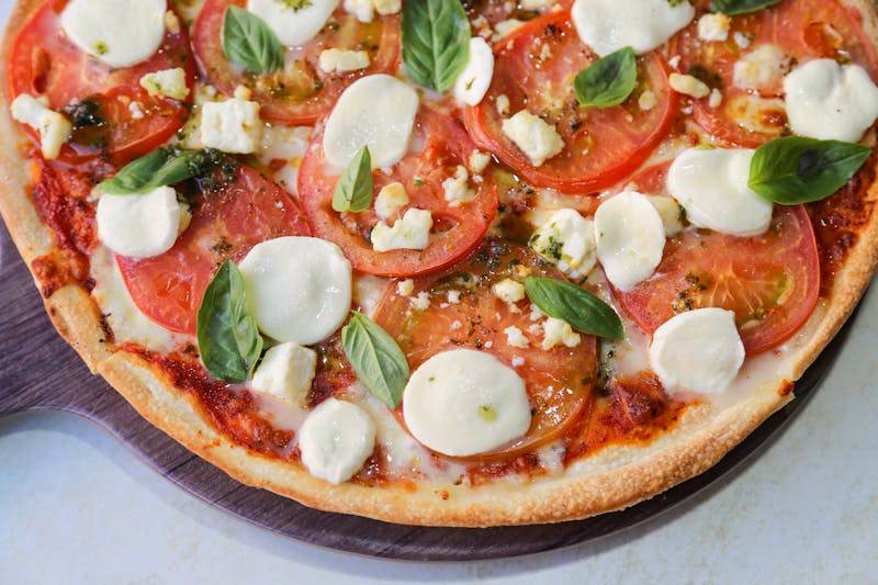 Margherita pizza luce with fresh basil and buffalo mozzarella