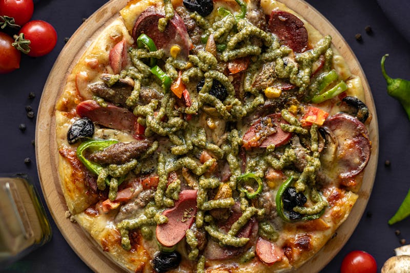 Veggie Garden pizza with roasted vegetables and pesto