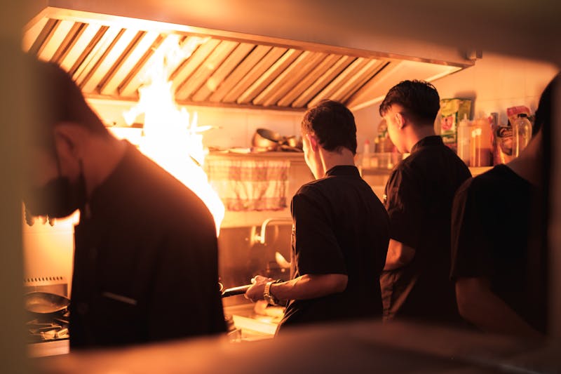 Pizza luce team members working together in the kitchen